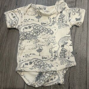 Kate Quinn Cream and Black Bodysuit